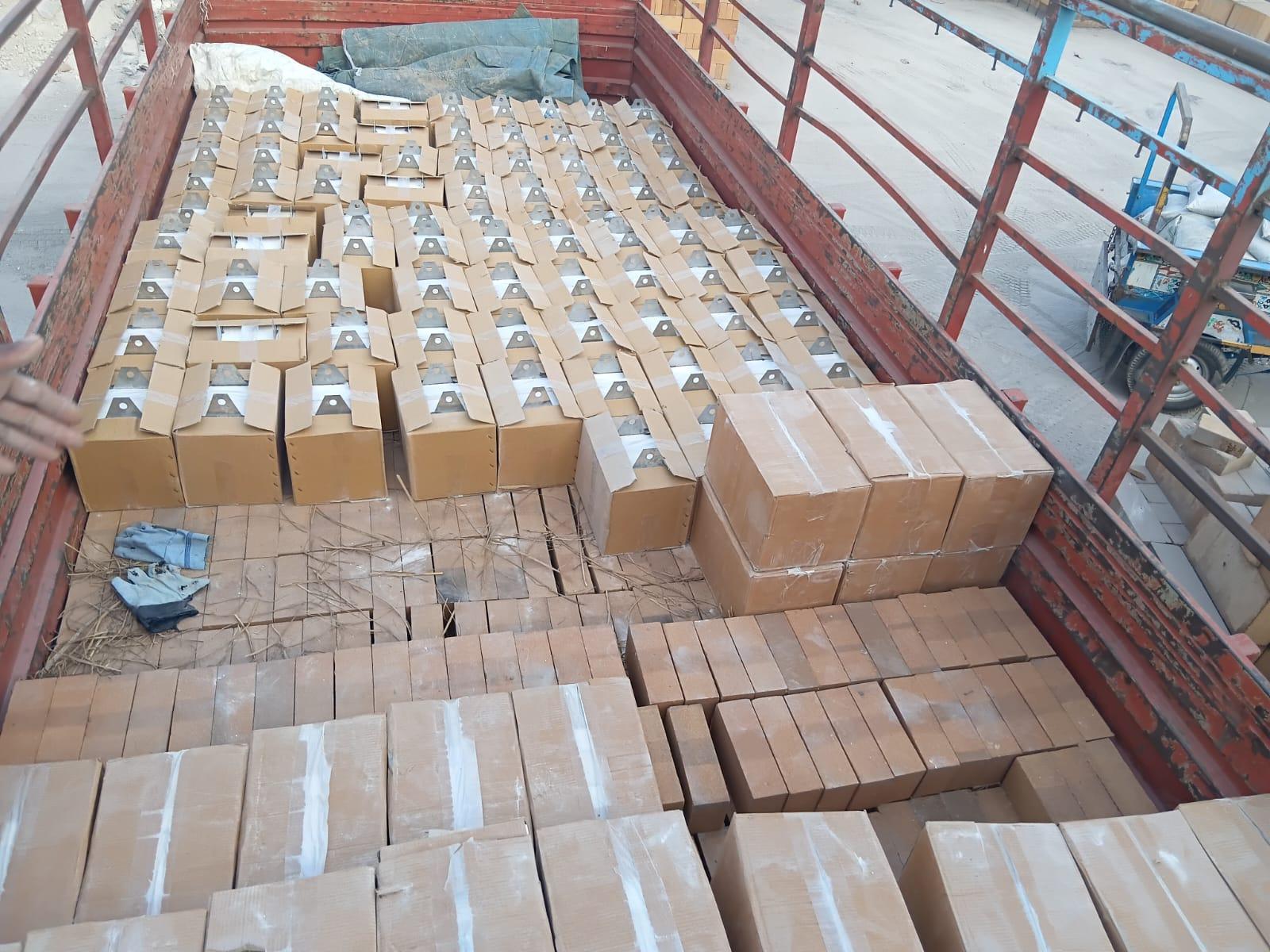 Cartons of refractory domes with anchors loaded with mixed refractory materials