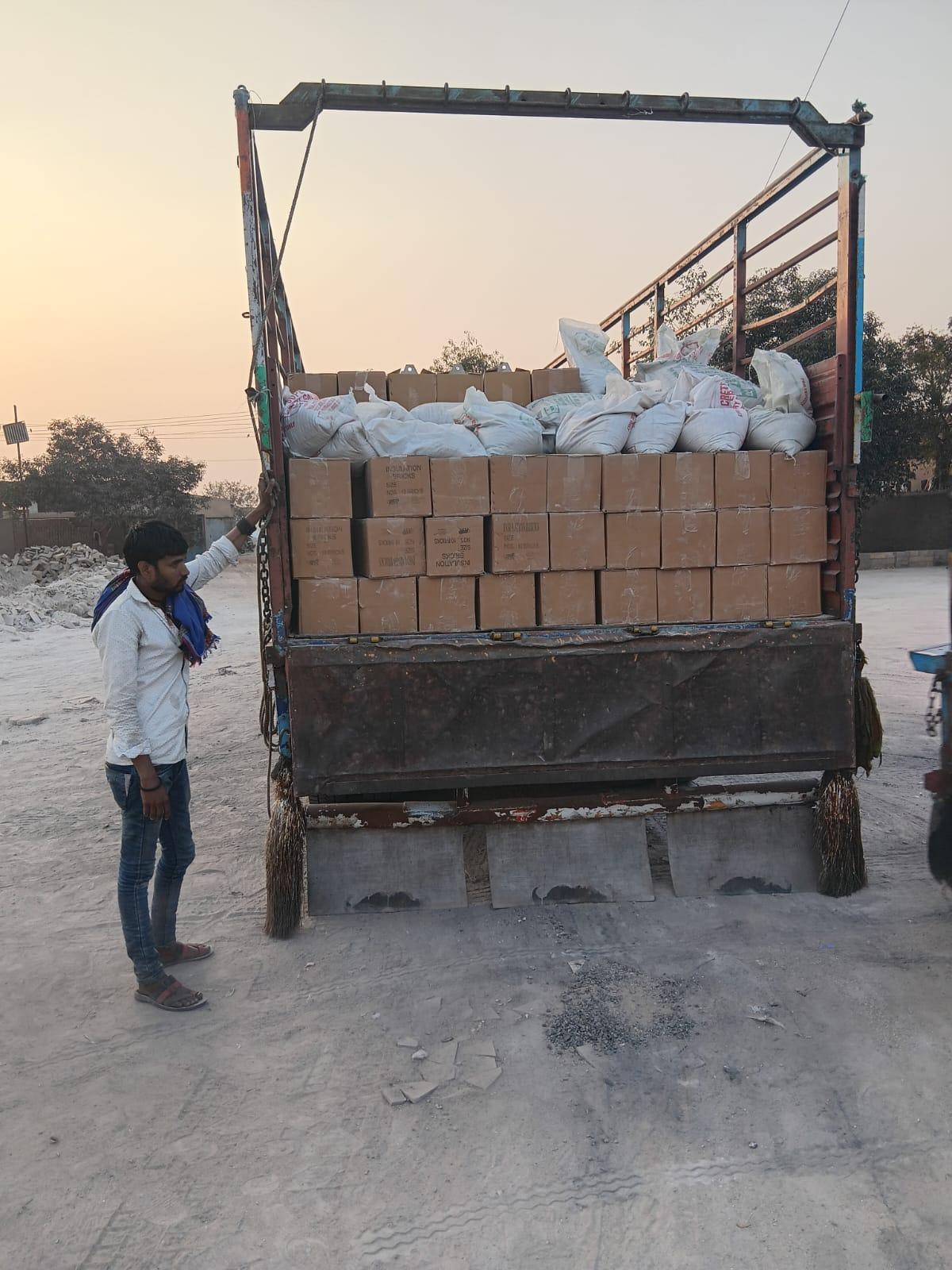 Loose cartons and tubs of refractory materials loaded for dispatch